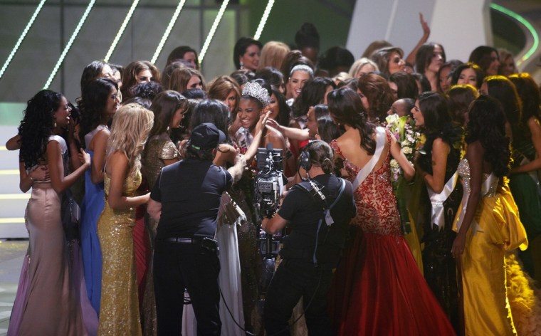 Image: Miss Angola Leila Lopes is congratulated by other contestants after being crowned Miss Universe 2011 during the Miss Universe pageant in Sao Paulo