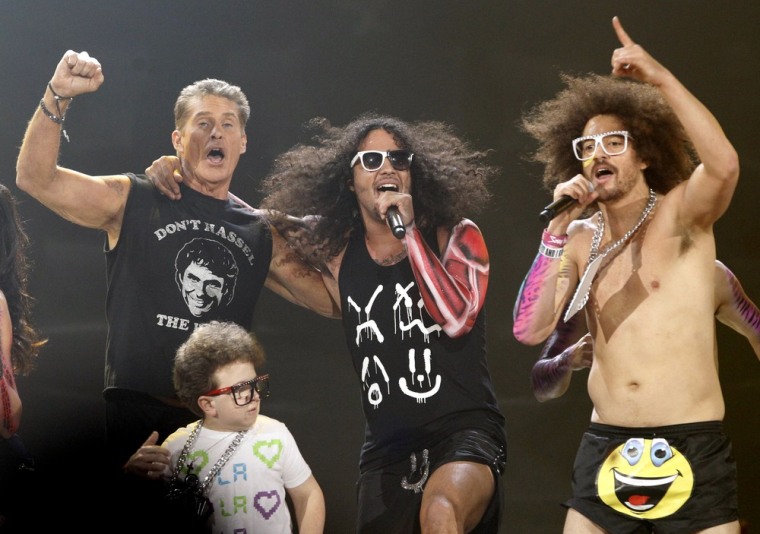 Image: Actor Hasselhoff, internet star Cahil, and SkyBlu and DJ Redfoo of pop group LMFAO perform at the 2011 American Music Awards in Los Angeles