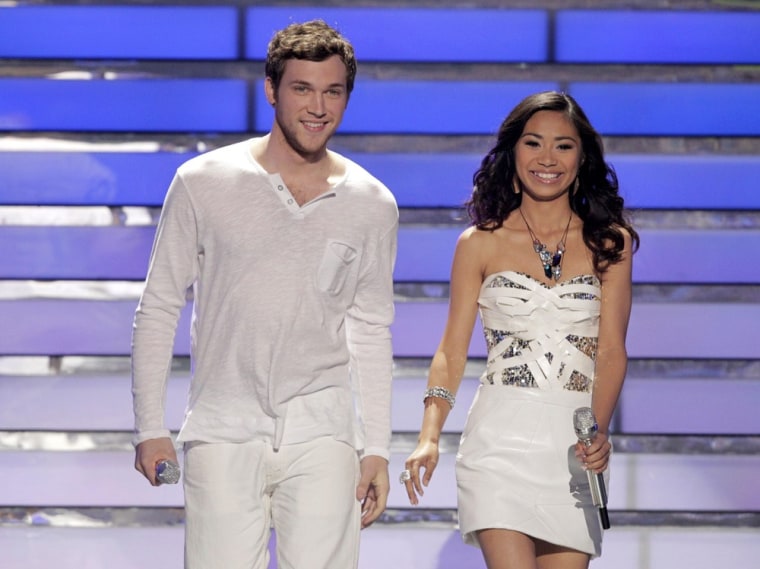 Image: Finalists Phillip Phillips and Jessica Sanchez stand on stage during the 11th season finale of \"American Idol\" in Los Angeles
