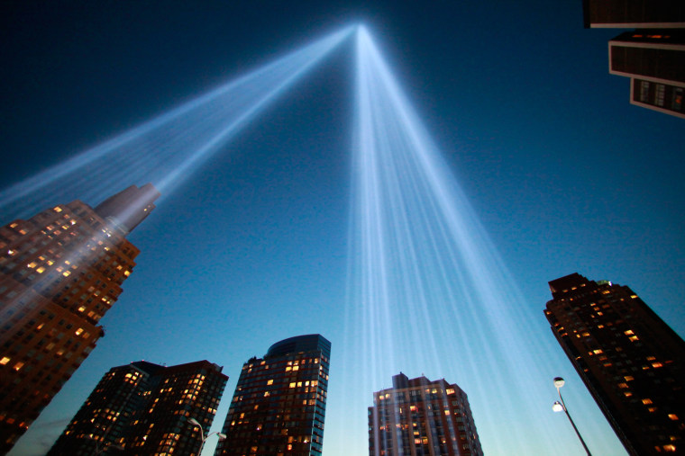 Image: The Tribute in Light illuminates the sky over Lower Manhattan in remembrance of the 9/11 attacks on the 11-year anniversary in New York
