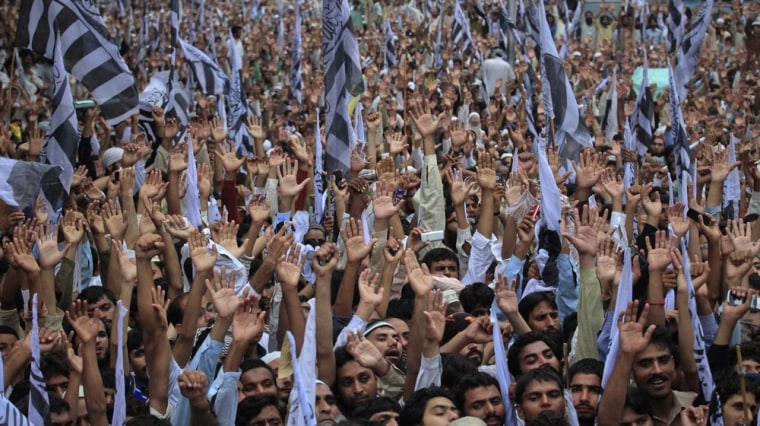 Image: Supporters of the Jamaat-ud-Dawa Islamic organization raise their hands  during an anti-American rally in Lahoree
