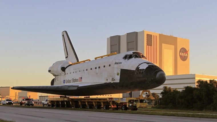 Image: The space shuttle Atlantis is moved to its new home at the Kennedy Space Center Visitor Complex in Cape Canaveral