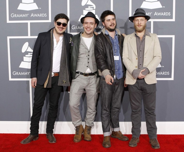 Image: English folk rock band Mumford &amp; Sons arrives at the 55th annual Grammy Awards in Los Angeles