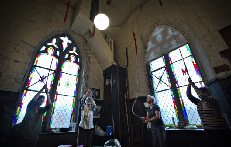 Image: Parishioners ring the 100-year-old bells in the tower of Holy Rosary Cathedral in honour of new Pope Francis in Vancouver