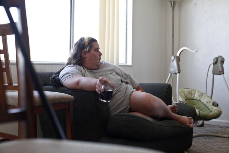 Image: Eason sits in side her Tucson, Arizona home