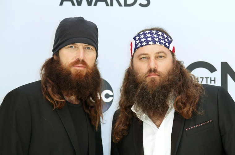 Image: Jase Robertson and Willie Robertson from the Duck Dynasty TV show pose on arrival at the 47th Country Music Association Awards in Nashville