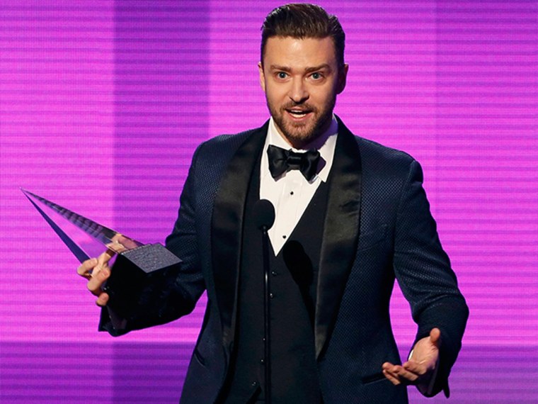 Image: Musician Justin Timberlake accepts the favorite pop/rock male artist award at the 41st American Music Awards in Los Angeles