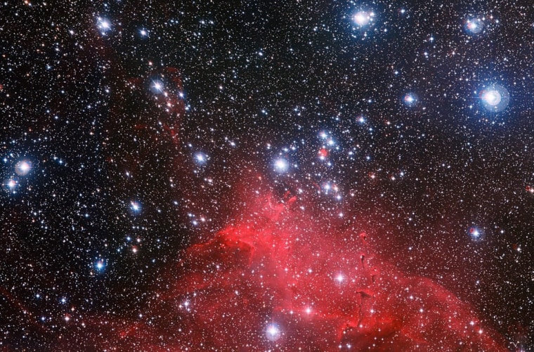 Image: The star cluster NGC 3572 and its dramatic surroundings