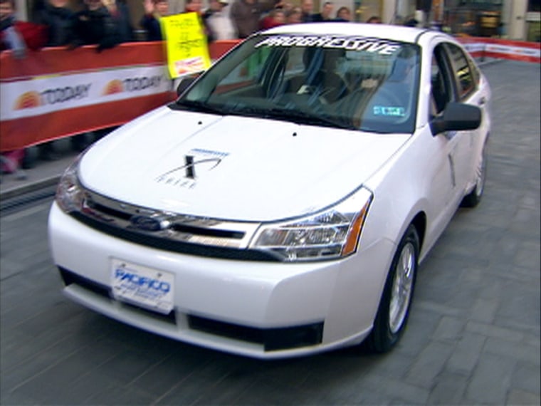 Image: Car driving on Rockefeller Plaza