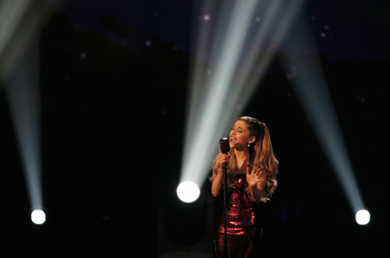 Image: Singer Ariana Grande performs a medley of songs at the 41st American Music Awards in Los Angeles