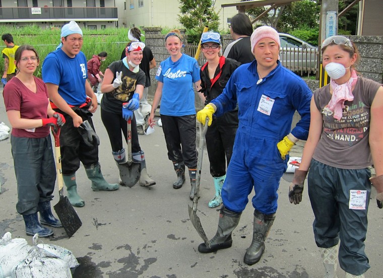 The VolunteerAKITA team takes a break from clearing drains in Ishinomaki over the holiday weekend.