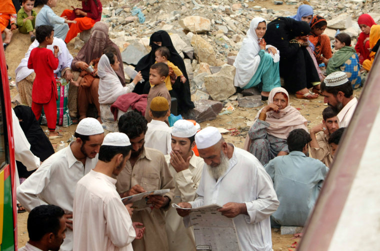 Image: Villages read of Taliban leader death