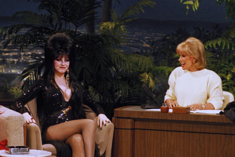 Joan Rivers, right, on ?The Tonight Show?  with one of her Halloween guests, Elvira (Cassandra Peterson) as herself in Los Angeles on Oct. 31, 1985. (AP Photo) No Sales