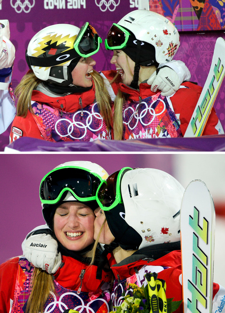 Canada's Justine Dufour-Lapointe, right, is congratulated by her sister, Chloe, after taking first place in the women's moguls final at the 2014 Winter Olympics, Saturday, Feb. 8, 2014, in Krasnaya Polyana, Russia. Justine won the gold medal and Chloe took the silver. (AP Photo/Jae C. Hong)

Canada's Chloe Dufour-Lapointe (L) and her sister Justine celebrate in the finish area during the women's freestyle skiing moguls final competition at the 2014 Sochi Winter Olympic Games in Rosa Khutor, February 8, 2014.                  REUTERS/Dylan Martinez (RUSSIA  - Tags: SPORT OLYMPICS SPORT SKIING)