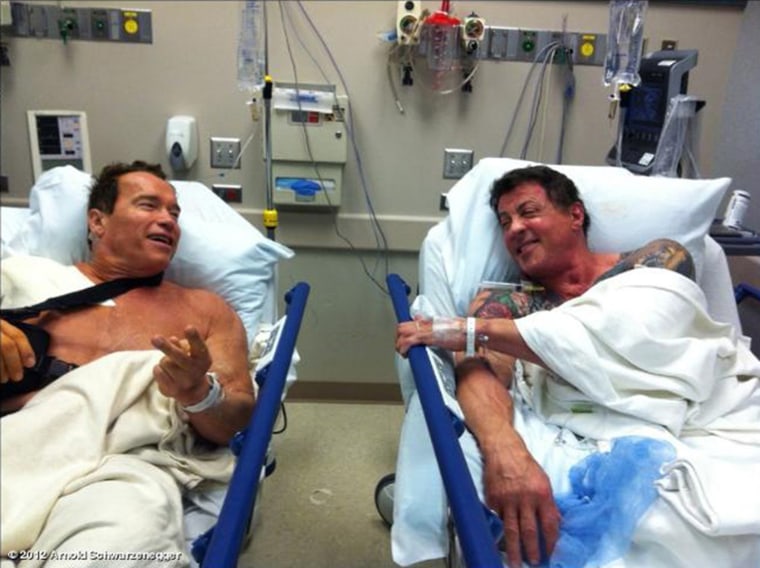 Image: Handout photo of Schwarzenegger and Stallone in Los Angeles hospital for work on their shoulders
