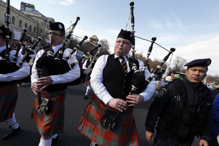 Image: Irish bagpipers perform during St Patrick's Day parade in Bucharest