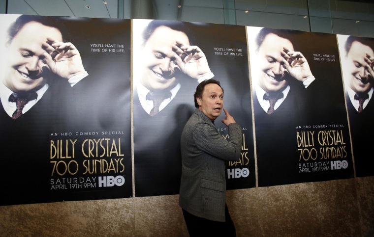 Image: Actor Crystal poses at the premiere of the HBO television comedy special \"700 Sundays\" in Los Angeles