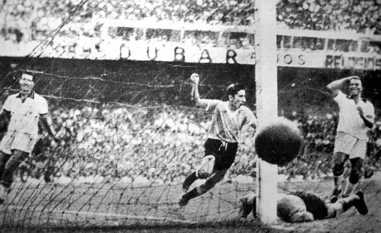 ** FILE ** Uruguay player Ghiggia scores during the World Cup Final, against Brazil, in the Maracana Stadium in Rio de Janeiro, Brazil, July 16, 1950 . Uruguay defeated  Brazil 2-1 to win the 1950 World Cup. (AP Photo)