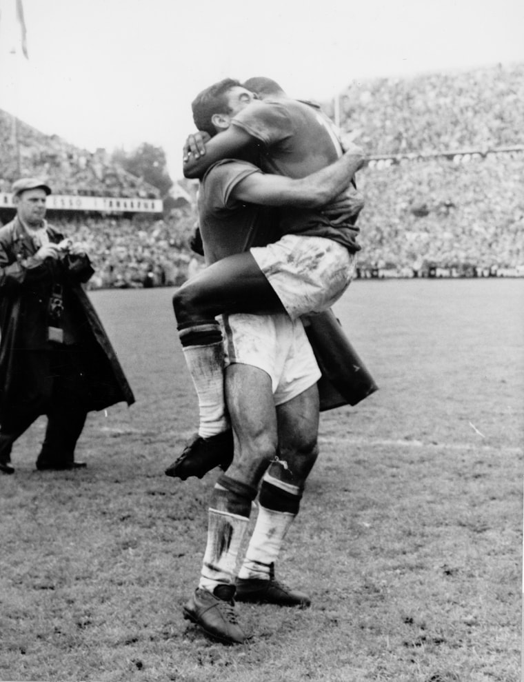 Santos (left) and Pele Brazil, hug each other after Brazil won the World Cup Final, in Rasunde Stadium, Stockholm, June 29,1958.Brazil defeated Sweden in the Final  5-2 and won the Jules Rimet Trophy. (AP-Photo/hg/SUB,Reportagebild)
