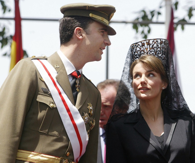 Image: Spain's Princess Letizia (R) looks at he