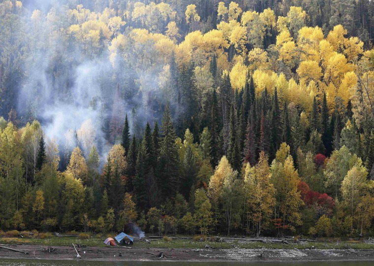 Image: A fishermen's camp is seen on a bank of the Yenisei River in the Taiga district outside Krasnoyarsk