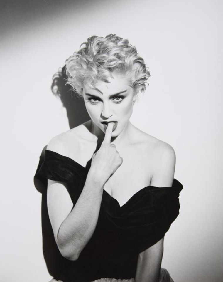 An original black and white photograph of Madonna taken by Herb Ritts in 1986 as part of the Madonna Hollywood session. Marked on verso in pencil, \"3396/7.\"\"