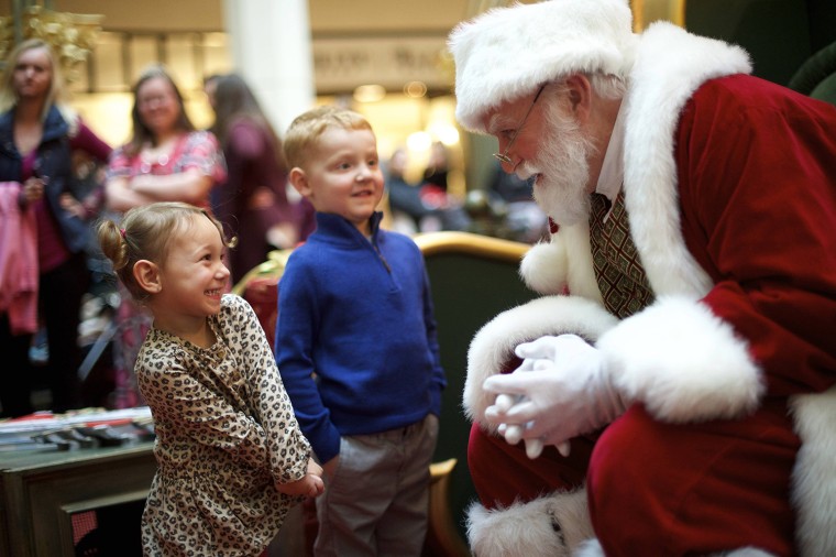 Image: Brayden Knowles greets Santa Claus, with brother Brynlie at The Plaza, King of Prussia Mall in King of Prussia