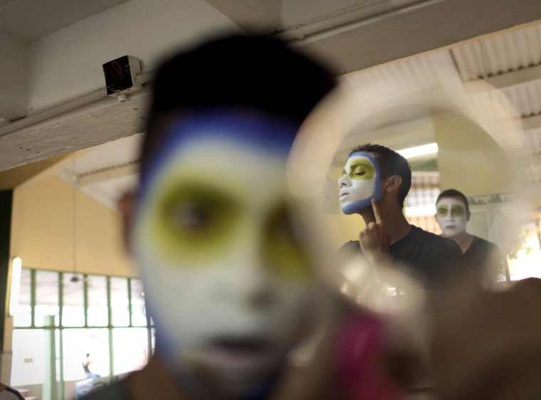 Image: Boys prepare before a parade as part of the Barranquilla Carnival in Barranquilla