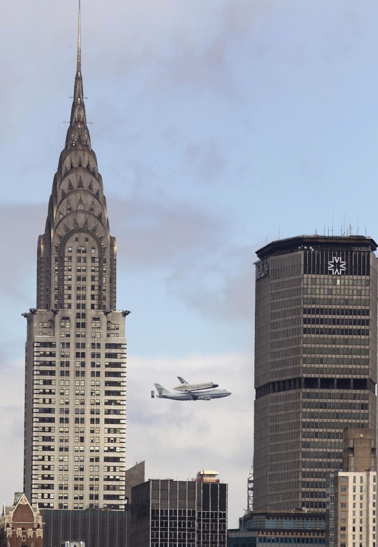 Image: Space Shuttle Enterprise, rides atop a NASA modified 747 plane over New York