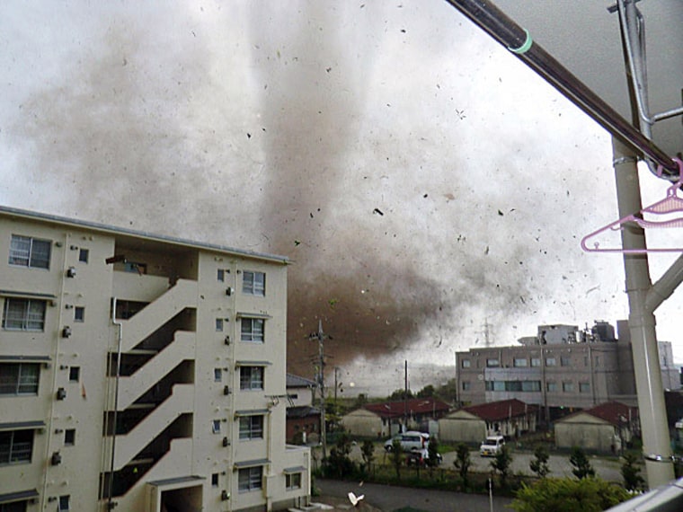 Image: Tornado is seen in Tsukuba, north of Tokyo, in this picture taken by a resident of Tuskuba and released by Kyodo