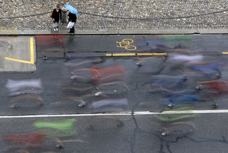Image: A longtime exposure shows participants taking part in the Grand Prix of Bern running event in Bern