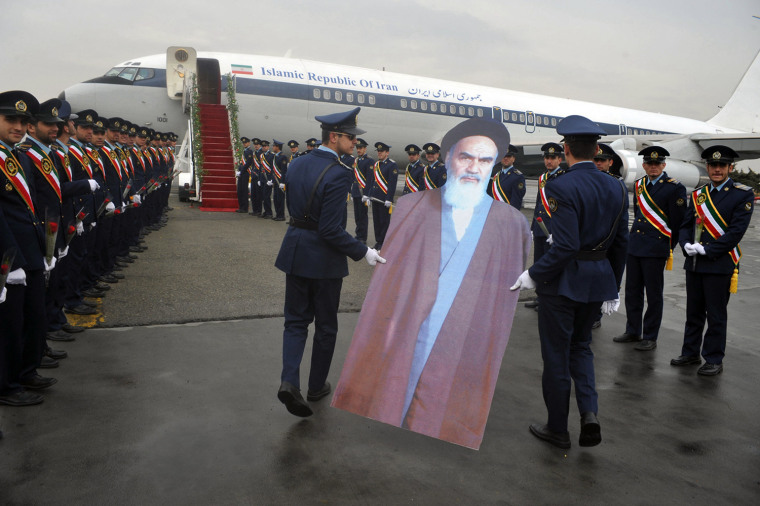 Image: Members of the Iranian army's air force re-enact the scene of Ayatollah Ruhollah Khomeini's arrival to Iran in 1979 at Merhrabad airport, in Tehran