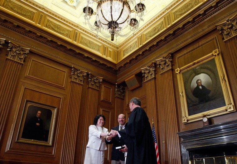 Image: Newly sworn-in U.S. Supreme Court Justice Sotomayor is congratulated by Chief Justice Roberts in Washington