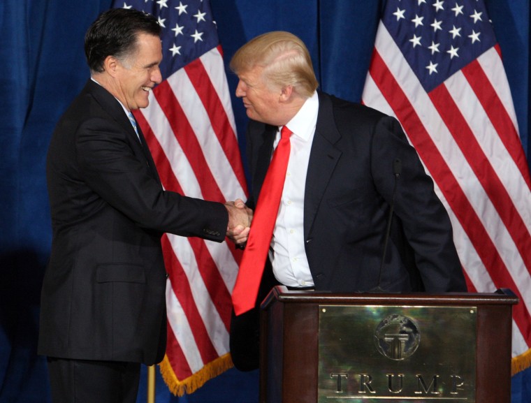Image: Republican presidential candidate and former Massachusetts Governor Mitt Romney is endorsed by Donald Trump in Las Vegas
