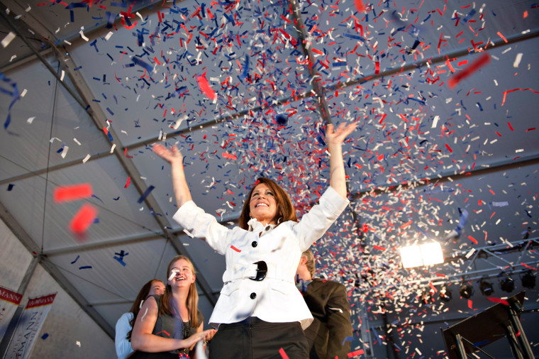 Image: Republican U.S. presidential candidate and Minnesota Congresswoman Bachmann waves to supporters after speaking during the Iowa straw poll in Ames