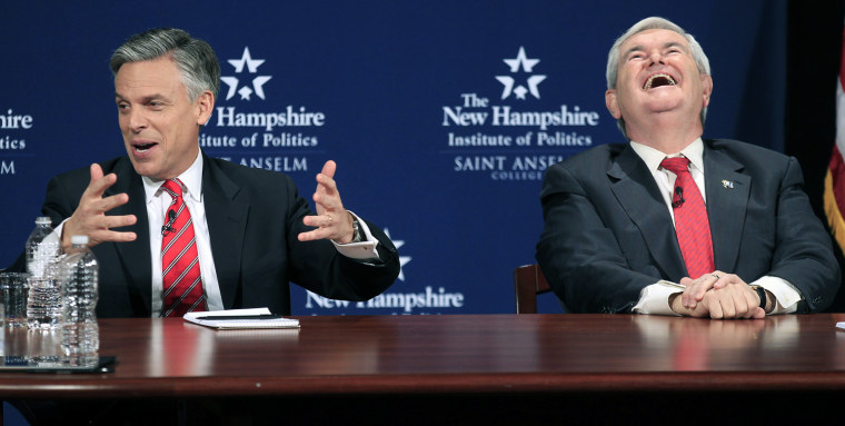 Image: U.S. Republican presidential candidates former Utah Governor Huntsman speaks as former U.S. House Speaker Gingrich laughs during their Lincoln-Douglas style debate in Manchester