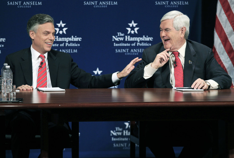Image: U.S. Republican presidential candidates Huntsman and Gingrich laugh during their debate at St. Anselm College in Manchester