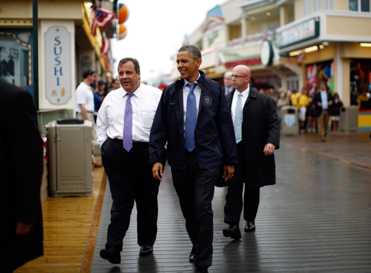 Image: U.S. President Barack Obama and New Jersey Governor Chris Christie walk on the boardwalk at Point Pleasant in New Jersey