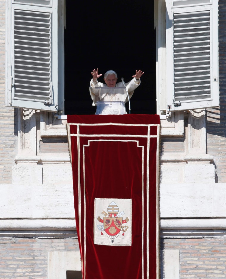 Image: Pope Benedict XVI waves as he leads the Sunday angelus prayer in Saint Peter square at the Vatican