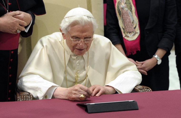 Image: Pope Benedict XVI posts his first tweet using an iPad tablet after his Wednesday general audience in Paul VI's Hall at the Vatican