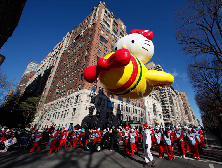 Image: The Hello Kitty balloon floats down Central Park West during the 87th Macy's Thanksgiving Day Parade in New York