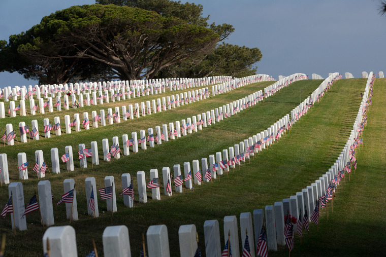 On Memorial Day tiny American flags are placed at each grave at Fort Rosecrans National Cemetery, honoring each soldier killed in action, in May 2014. Photo by: Frank Duenzl/picture-alliance/dpa/AP Images