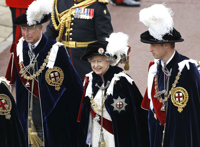 Image: Britain's Queen Elizabeth walks in procession with Prince Charles and Prince William as they attend the annual Order of the Garter Service at St George's Chapel at Windsor Castle in Windsor