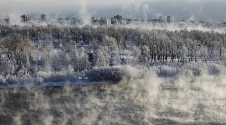 Image: A frosty fog stretches above the Yenisei River with the air temperature at about minus 30 degrees Celcius in Russia's Siberian city of Krasnoyarsk