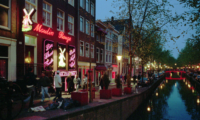 Amsterdam has plans to close some of the 223 'coffee shops' in the red-light district to tackle criminal activity in the area.