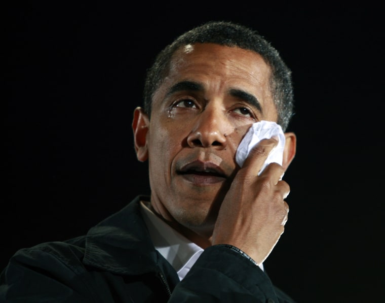 Democratic presidential nominee Obama wipes a tear from his eye during a campaign rally in Charlotte