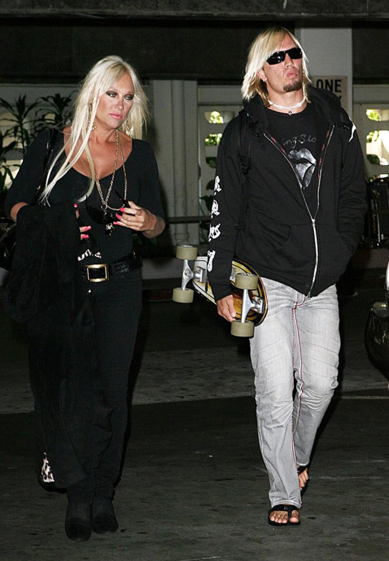 Linda Hogan arrives at LAX with her Toy Boy lover