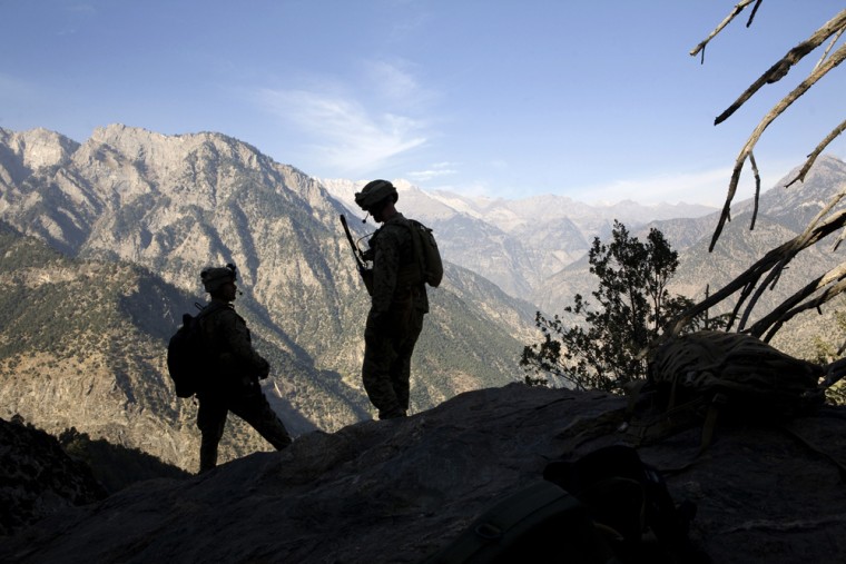 United States Marines at the top of a peak in Kamu, Afghanistan, Oct. 27, 2008