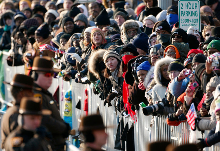 Crowds of spectators line the inaugural parade route for U.S. President Barack Obama in Washington