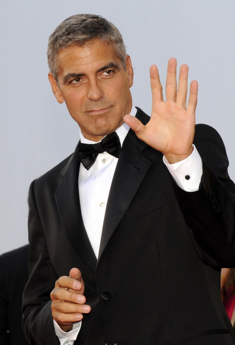 US actor George Clooney poses before the